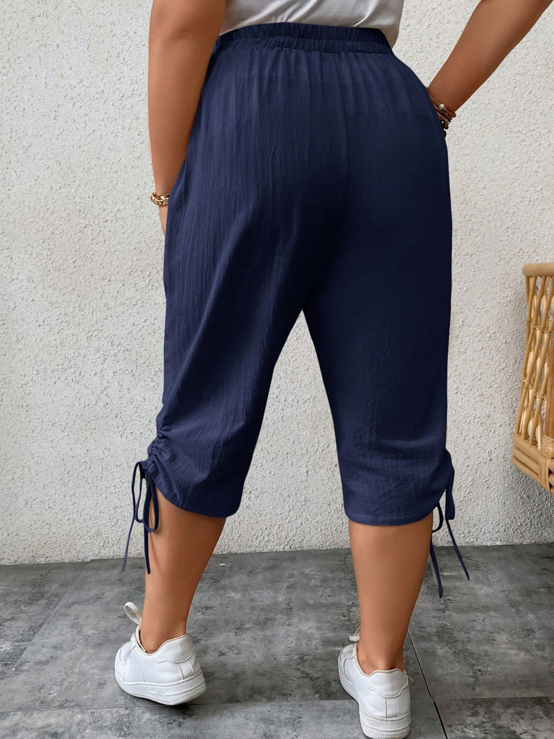 Calça feminina tipo capri com ajuste lateral Paola. Plus Size