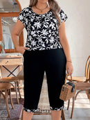 Conjunto feminino com calça tipo capri e blusa com zíper Nadia. Plus Size
