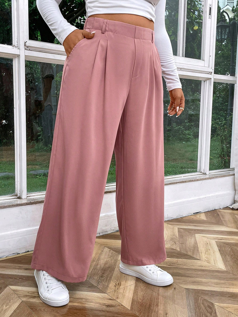 Calça feminina de cintura alta com pregas Iris. Plus Size