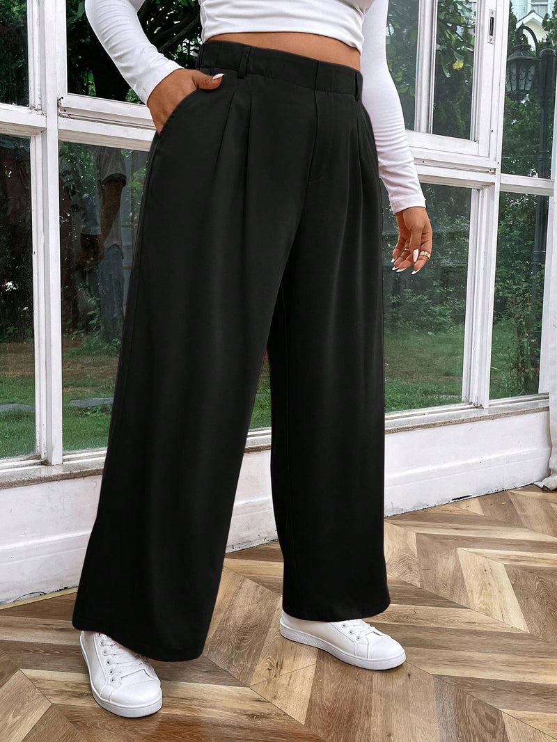 Calça feminina de cintura alta com pregas Iris. Plus Size