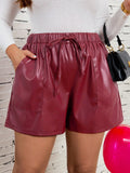 Short feminino com elástico na cintura e bolso frontal Heidy. Plus Size