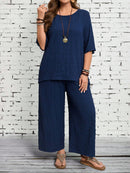 Conjunto Feminino camisa em gola redonda e calças de perna larga - Ligía. Plus Size